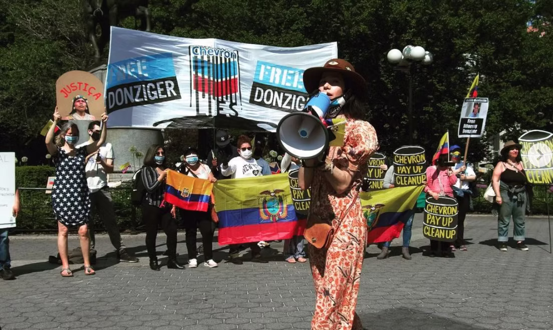 Protesters with banners and megaphone